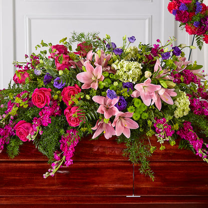 Radiant Tribute Casket Spray – MC SHANES FLORIST & GREENHOUSE INC, Belle Vernon PA
