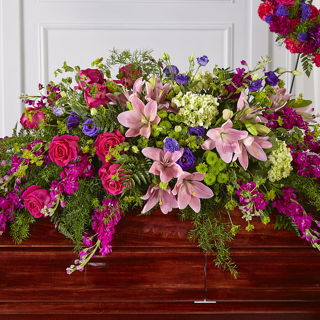 Radiant Tribute Casket Spray – MC SHANES FLORIST & GREENHOUSE INC, Belle Vernon PA